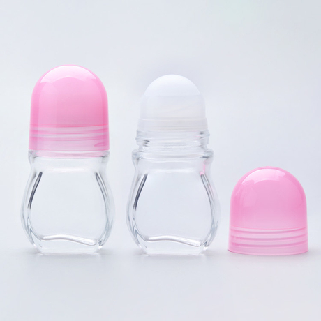 Claro transparente coloreado de la botella vacía del rodillo del perfume con el casquillo plástico